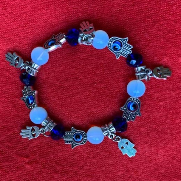 Jewelry - New silver evil eye Chamsa bracelet silver blue metal